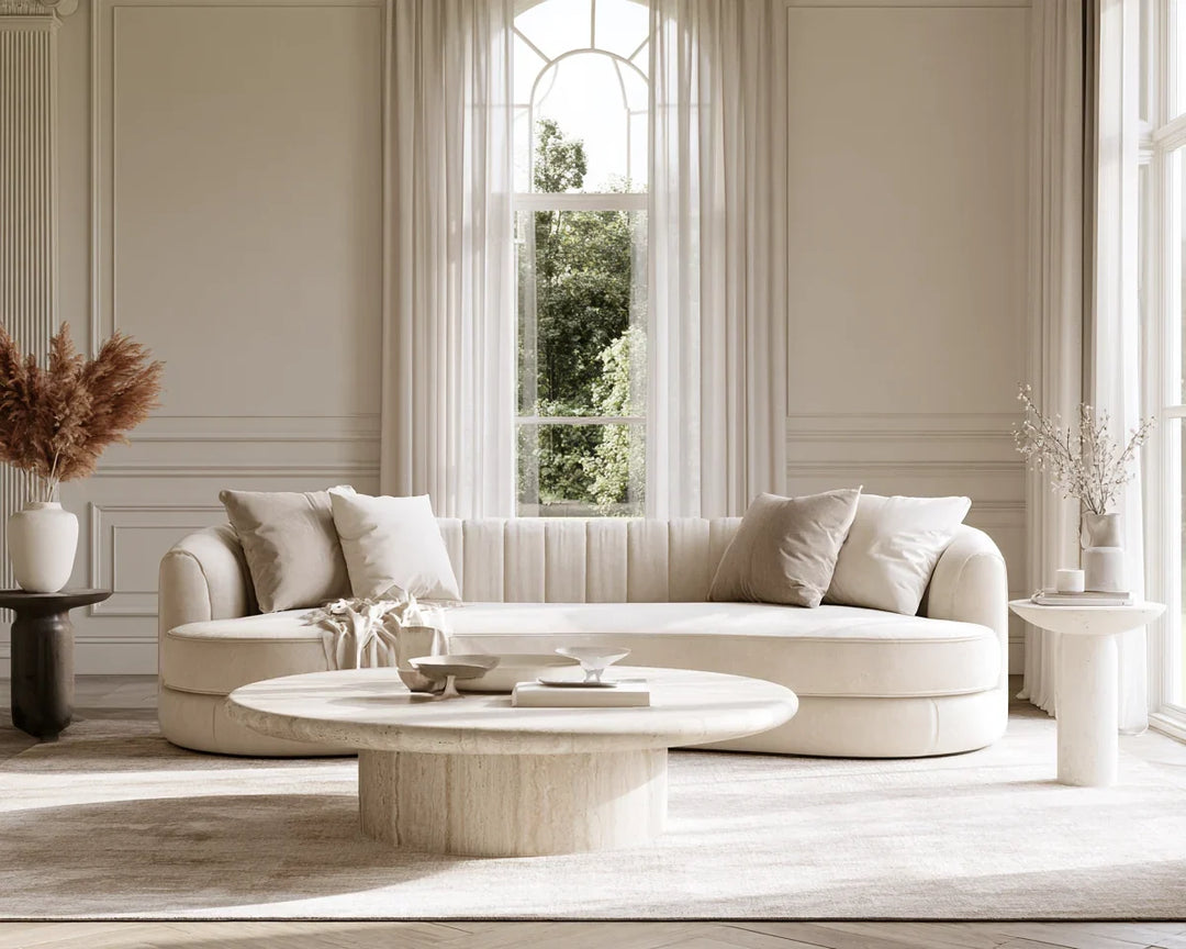 Luxury cream sofa with travertine coffee table in a timeless British living room