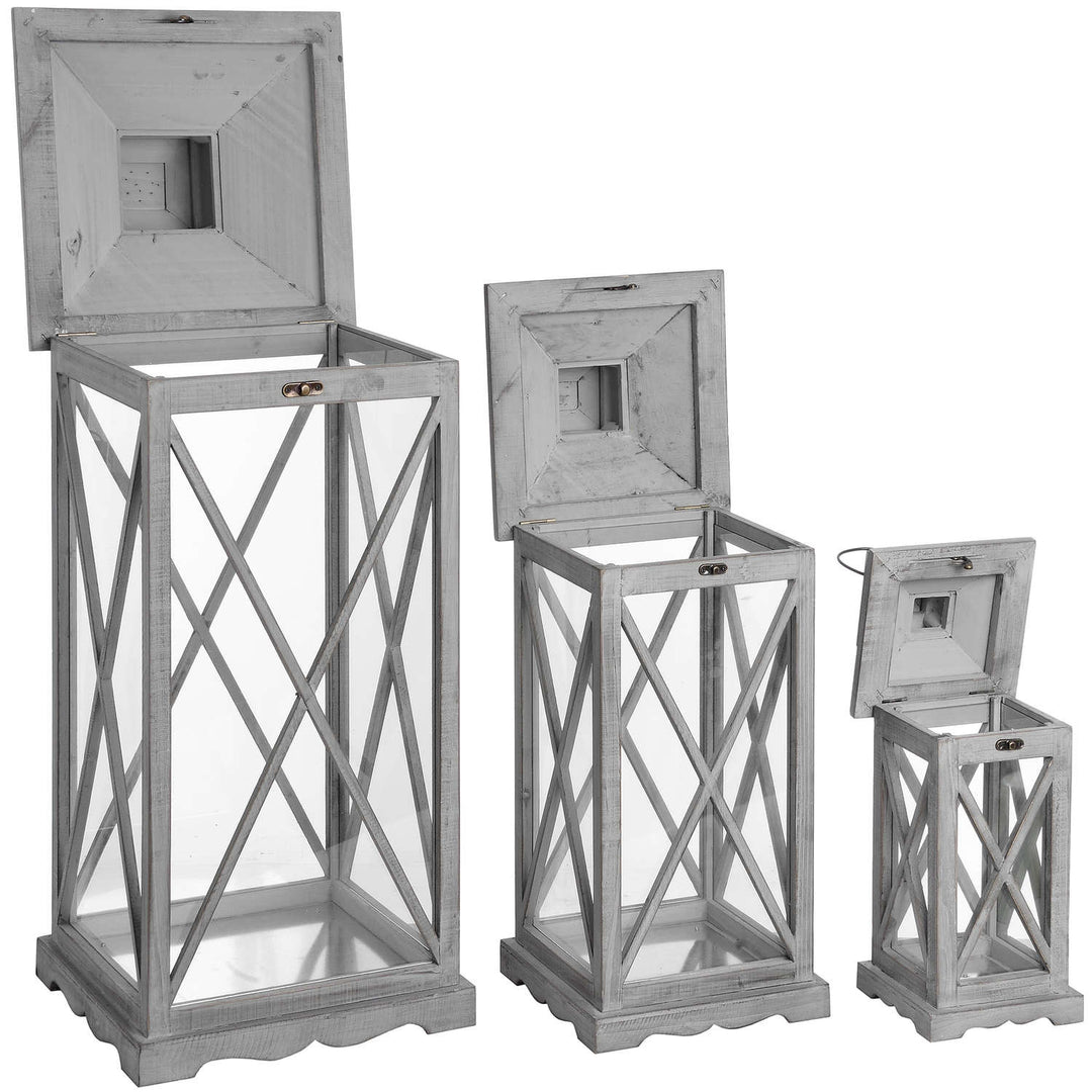 Set Of Three Wooden Lanterns With Traditional Cross Section by Hill Interiors