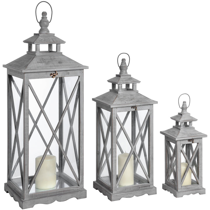 Set Of Three Wooden Lanterns With Traditional Cross Section by Hill Interiors