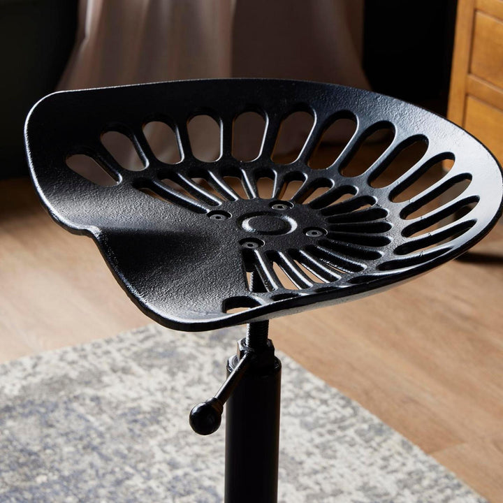 Adjustable Tractor Seat by Hill Interiors